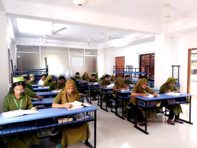 Midwifery students studying in their classroom