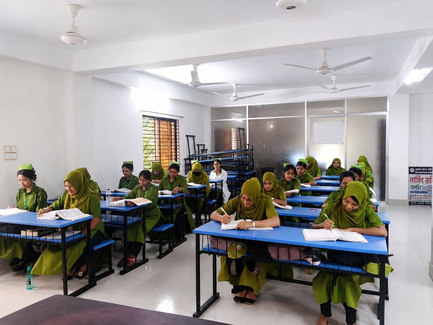 Midwifery students reading during class